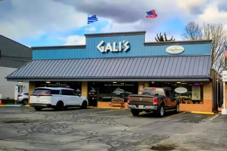 Exterior view of a Greek restaurant storefront.