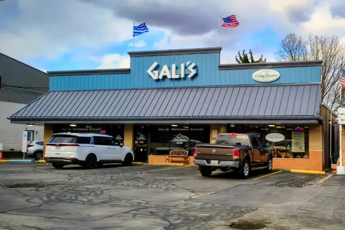 Exterior view of a Greek restaurant storefront.