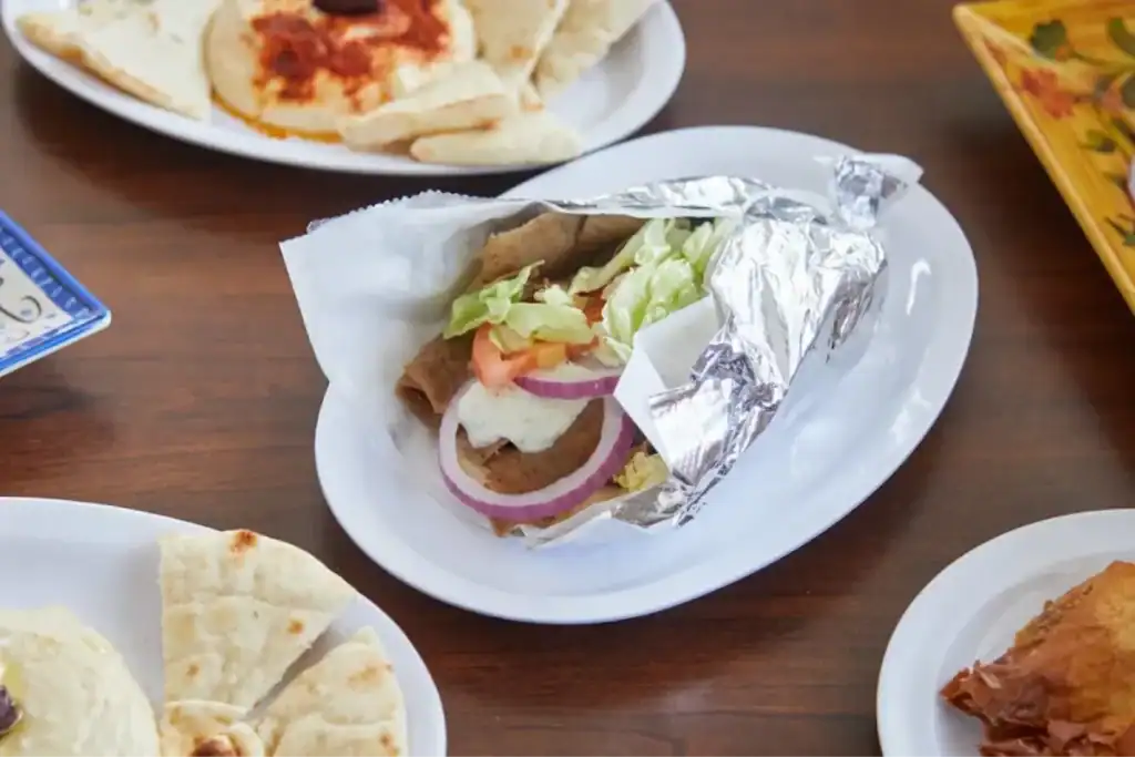 Mediterranean gyro wrap with fresh vegetables and traditional flavors